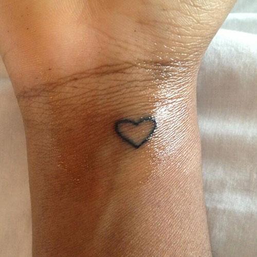 ame heart wrist tattoo