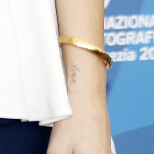 ashley greene love wrist tattoo