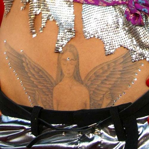 asia argento angel stomach tattoo