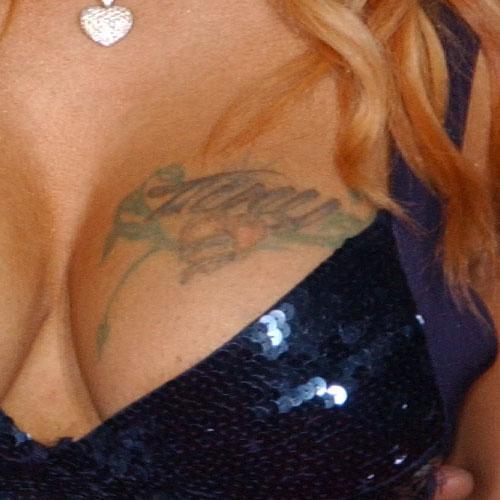 tameka tiny harris breast tattoo
