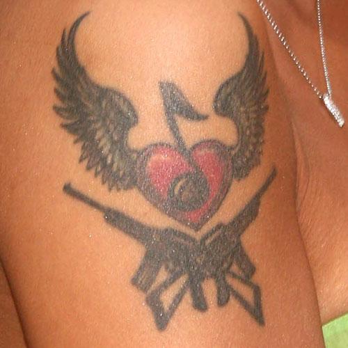 tila tequila wings arm tattoo