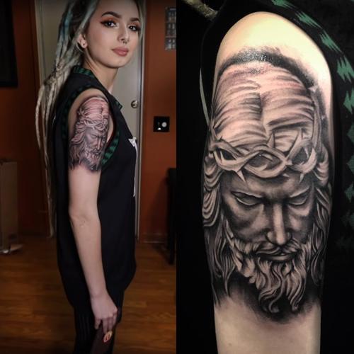 zhavia ward jesus upper arm tattoo