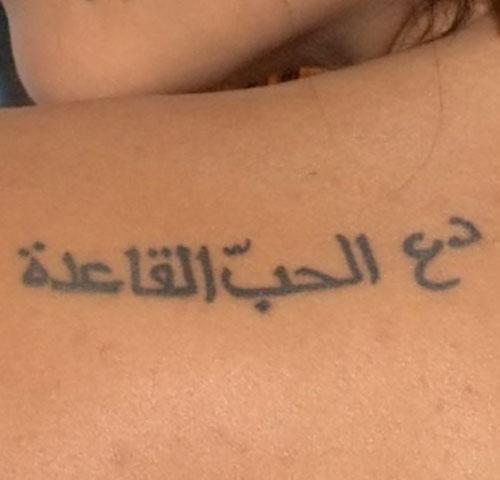 zoe kravitz arabic back tattoo