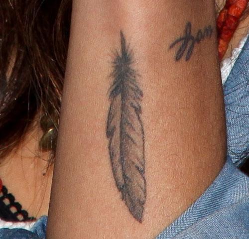 zoe kravitz feather arm tattoo