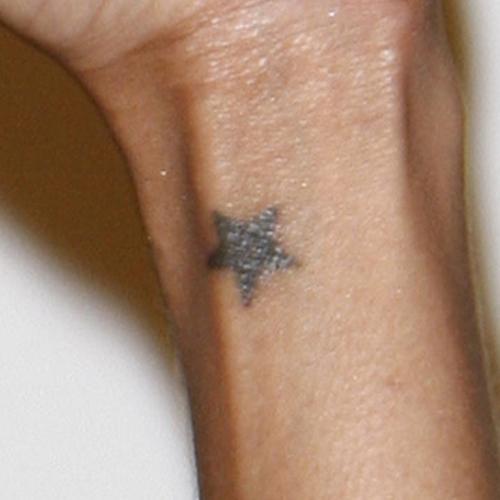 zoe saldana star wrist tattoo